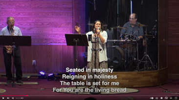 Professor Gall playing drums in church.